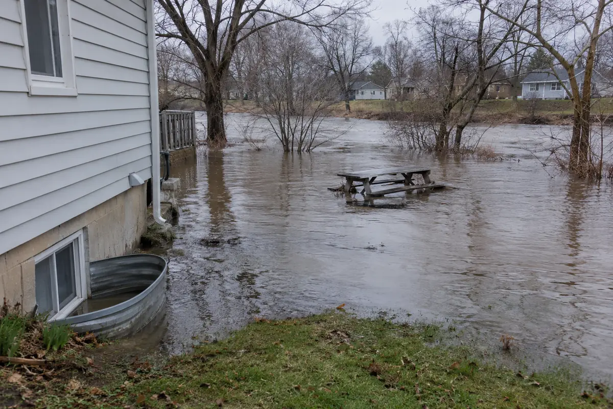 Water damage restoration technician working on a property in DeWitt, MI